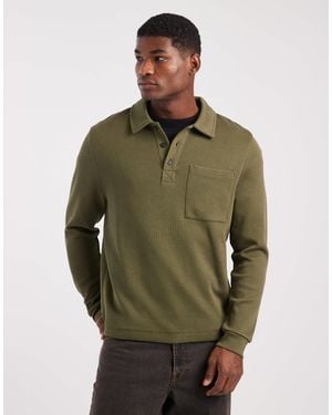 ASOS Polo boutonné oversize à poche - kaki - Vert