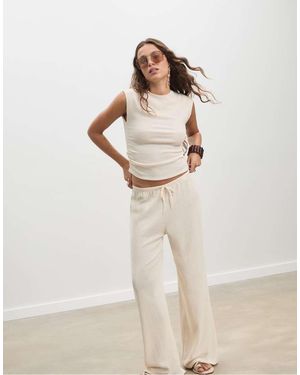 Stradivarius Flowing Creased-effect Trousers - Natural