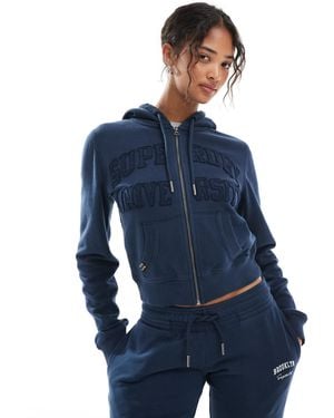Superdry – athletic essentials – farblich abgestimmte, cropped-kapuzenjacke - Blau