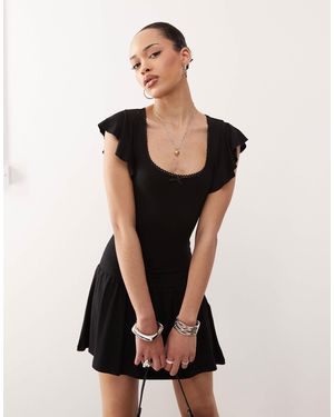 Motel Toinette Drop Waist Mini Dress - Black