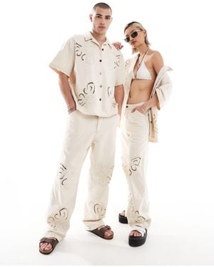 Reclaimed (vintage) Limited Edition Unisex baggy Ecru Jeans With Embroidery And Cutwork Detail-white