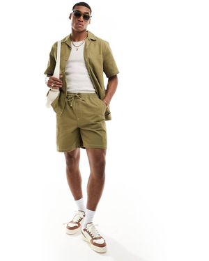 ASOS Camicia Vestibilità Comoda Kaki Con Rever E Cuciture A Contrasto - Verde