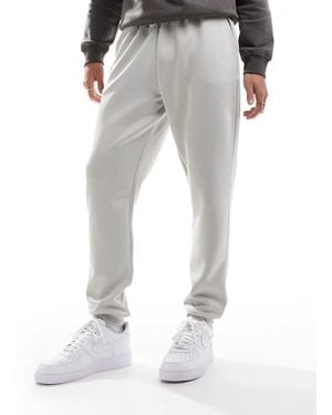 ASOS Joggers Gris Claro De Corte Pitillo De Tejido Efecto Neopreno De