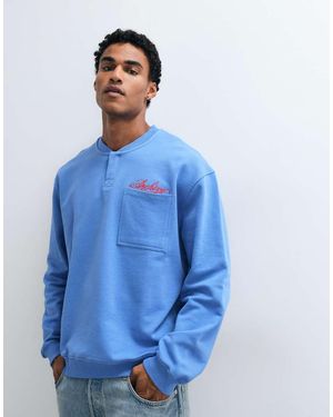ASOS Relaxed Loopback Bomber Henley With Machine Embroidery Detail - Blue