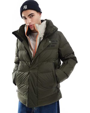 Superdry – sport-steppjacke aus mikrofaser - Grün