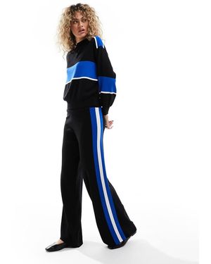 Mango Pantaloni Comodi A Zampa Neri Con Righe - Blu