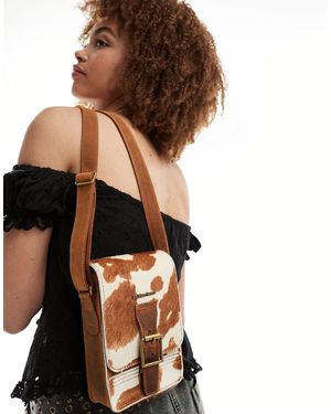 Dr. Martens Jersey Cow Print Reporter Bag - Brown