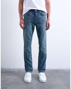 TOPMAN Vaqueros Elásticos De Corte Slim Con Lavado Medio De -Azul