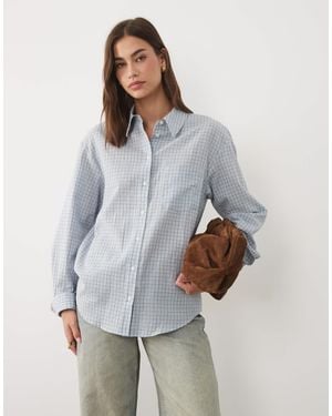 Mango – oversize-hemdbluse mit em karomuster - Grau