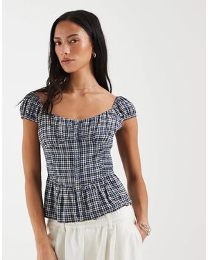 Hollister Sweetheart Peplum Top in White | Lyst