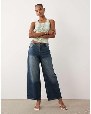 Juicy Couture Mid Rise Embroidered Crest Logo Wide Leg Jeans - Blue