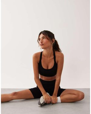 4505 Sculpting Seamless Medium Support Convertible Strap Sports Bra - Black