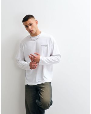 ASOS T-shirt oversize à manches longues et imprimé texte - Blanc