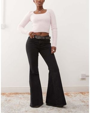 Monki Kikki Comfort Stretch Low Rise Super Flared Jeans - White