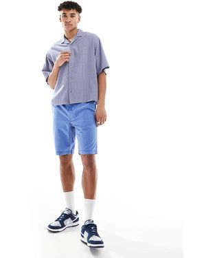 Superdry – vintage international – shorts - Blau