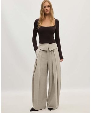 Stradivarius Wide-leg Trousers With Turned-up Waistband - Natural