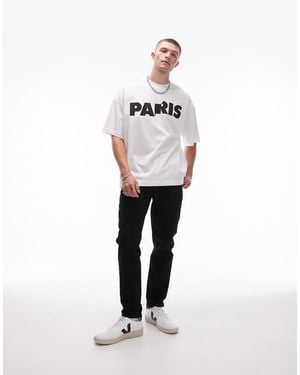 TOPMAN Vaqueros Tapered Negros Elásticos De - Blanco