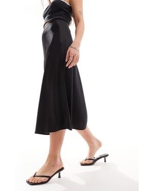 Monki Jupe mi-longue en satin - Noir