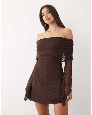 ASOS Flocked Polka Dot Mini Bardot Off Shoulder Dress With exaggerated Flute Sleeve - Brown