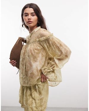 AllSaints – delphine – langärmlige bluse aus auffälliger spitze mit blumenmuster - Mettallic