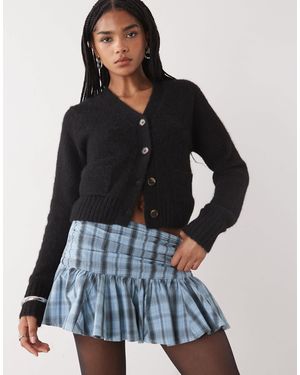 Monki Gilet court avec poches avant - Bleu