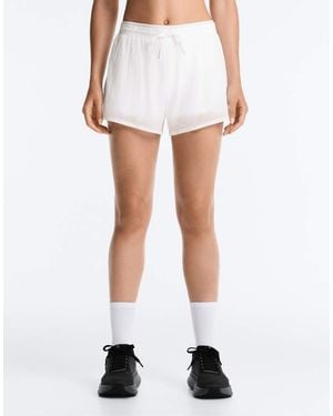 Oysho Technical Mid Rise 2-in-1 Check Shorts - White