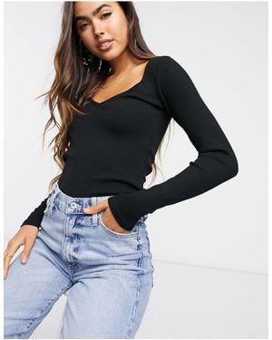 Camisetas y tops Stradivarius de mujer desde 8 Lyst