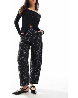 ASOS Pantaloni Sartoriali Jacquard A Fiori Neri Con Gamba Arcuata - Nero