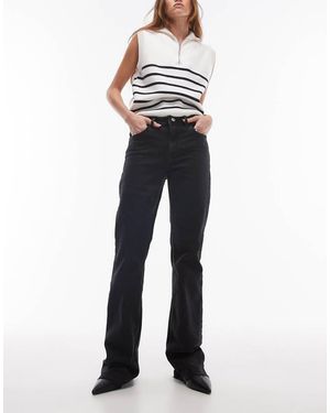 Mango Jeans Met Uitlopende Pijpen En Onafgewerkte Zoom - Blauw