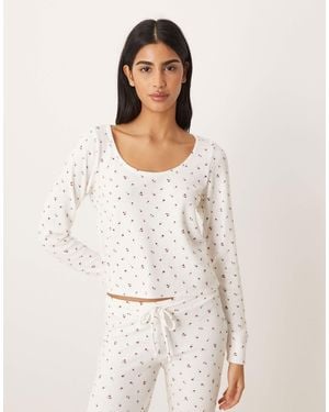 Hollister Gilly hicks - crop top d'ensemble en tissu gaufré imprimé fleuri avec manches longues et bordures dentelle - Blanc