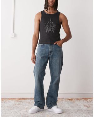 Weekday – mercury – relaxed fit bootcut-schlagjeans - Blau