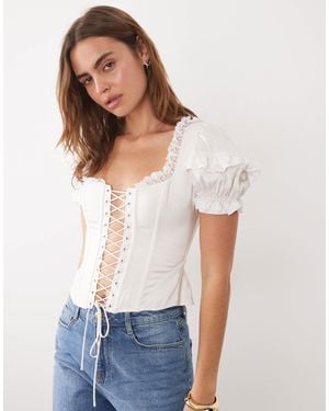 For Love & Lemons Isadora Lace Up Front Puff Sleeve Corset Bustier Top - White