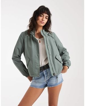 Vero Moda Short Festival Rain Coat With Hood And Drawstring Hem - Blue