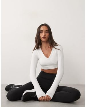 4505 Seamless Baby Rib Wrap Front Long Sleeve Top - White