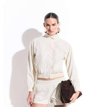 The Frolic Conjunto De Chaqueta Deportiva De Nailon Con Cuello Alzado En-Blanco