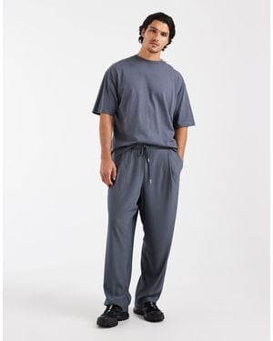 ASOS Relaxed Taper Pleated jogger - Blue