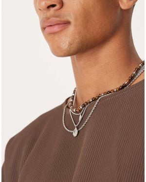 ASOS – 4er-pack gemischte, farbene festival-halsketten mit ketten- und perlendesign und anhänger - Braun