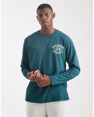 Superdry – athletic essentials – langärmliges oberteil - Blau