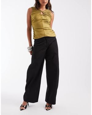 ASOS Broek Met Lage Taille En Hoefijzervormige Pijp - Blauw