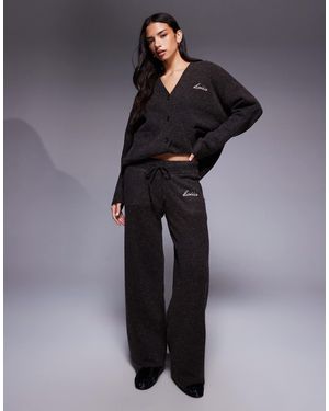 Kaiia Pantalon d'ensemble ample en maille avec broderie logo - marron - Bleu