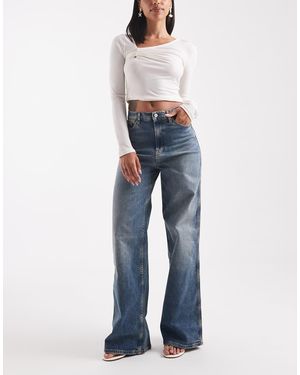 Tommy Hilfiger Charlie High Rise Wide Leg Jeans With Embroidered Logo - Blue