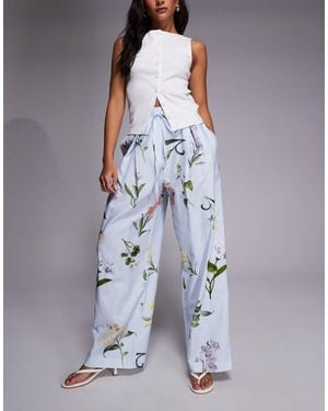 River Island Pantalon ample en lin imprimé fleuri - clair - Bleu
