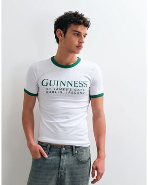 ASOS Muskelshirt mit ringer-ausschnitt und guinness-print - Weiß