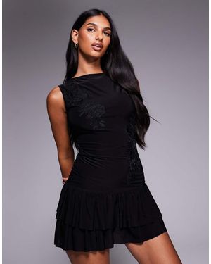 Fashionkilla Double-sculpted Slinky Slash Neck Low Back Ruffle Hem Flower Applique Mini Dress - Black