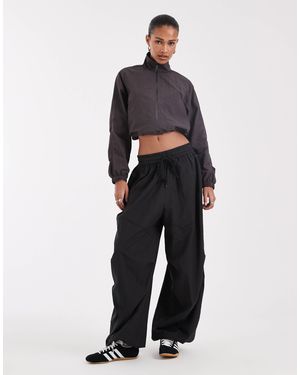 BRONZE SNAKE Pantalon cargo bouffant - Bleu