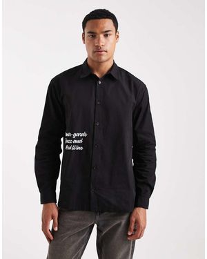 ASOS Camicia Comoda Nera Con Scritta Stampata Sul Davanti - Nero