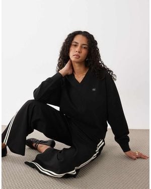 Calvin Klein Sudadera De Manga Larga Con Cuello De Pico Y Etiqueta Tejida En - Negro