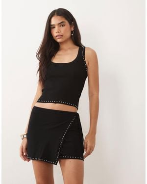 Mango – regaliz – mini-wickelrock - Schwarz