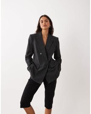 Mango Blazer ajusté à carreaux - Noir