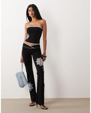 I.AM.GIA Daisy Cotton Blend Contrast Floral Cutout Flared Pants - Black